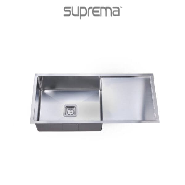 Suprema handcrafted stainless steel kitchen sink with a pop-up trash basket, gasket seals, and reversible clips.