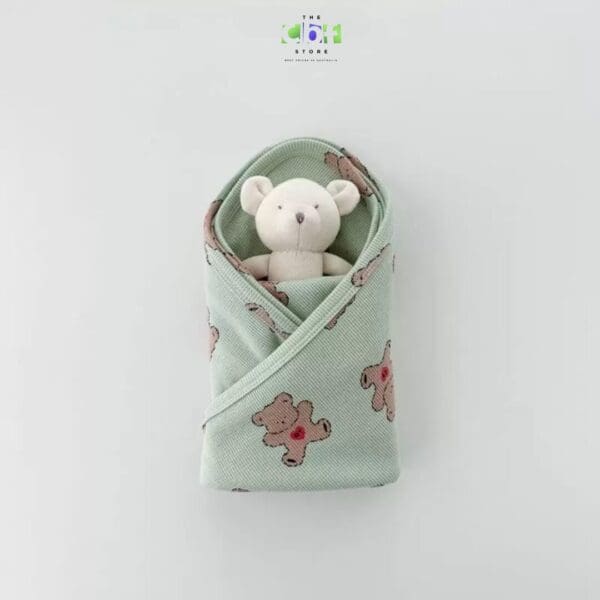 printed animal blanket for toddlers in mint green.