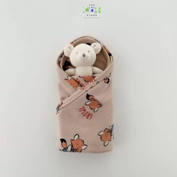 printed animal blanket for toddlers in beige.