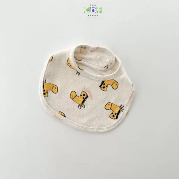 Cute animal bib in cream with animal prints