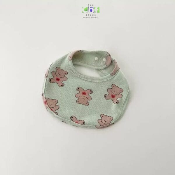 Cute animal bib in mint green with animal prints