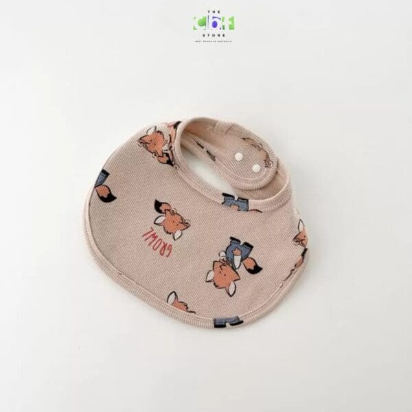 Cute animal bib in beige with animal prints